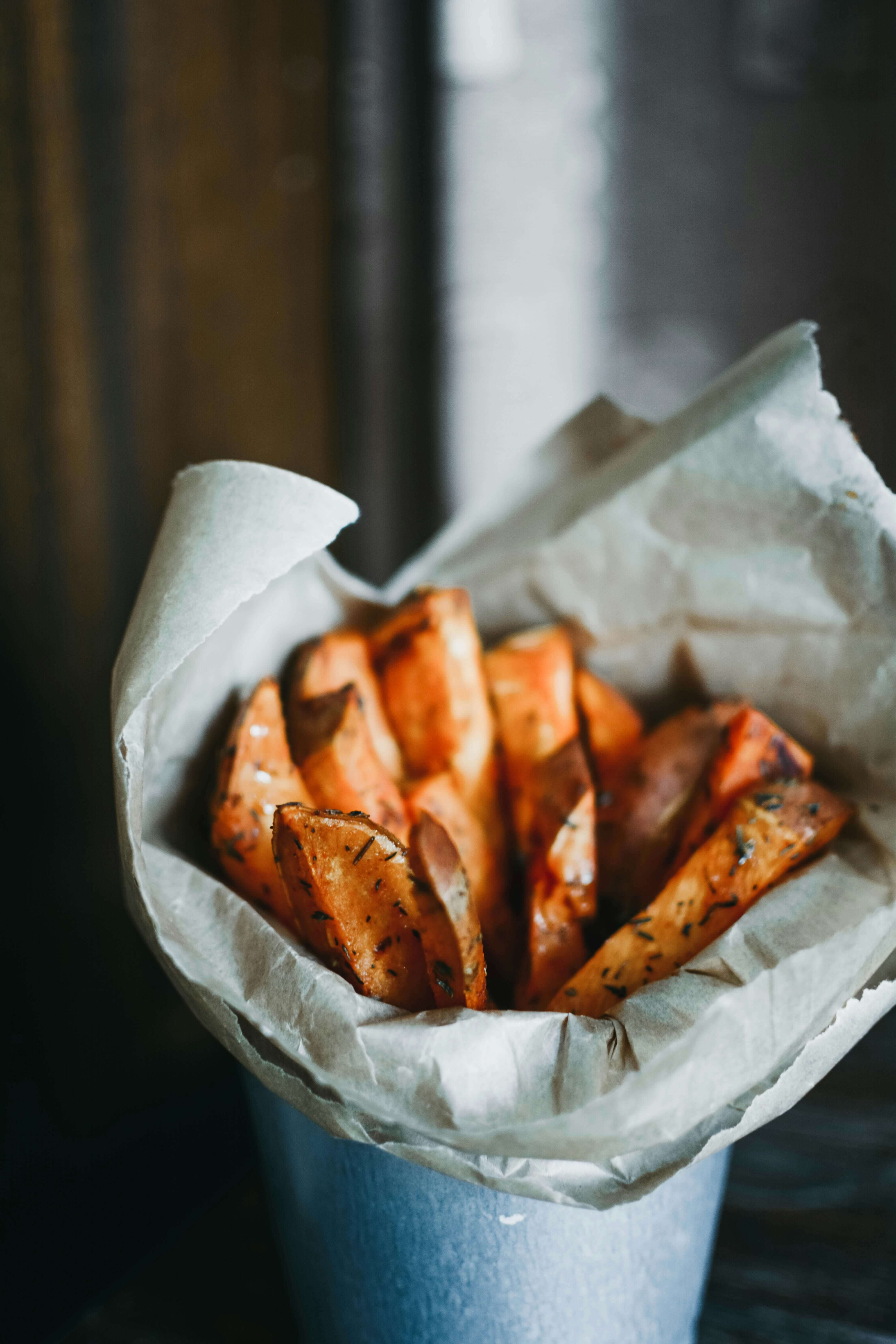 Oven-roasted Sweet Potato wedges with herbs